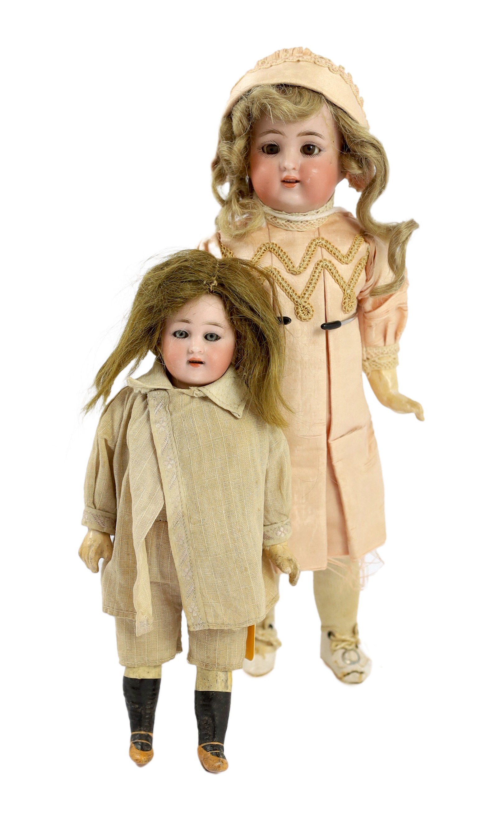 A Carl Hartmann globe baby doll, German, circa 1899, 8in. (2)